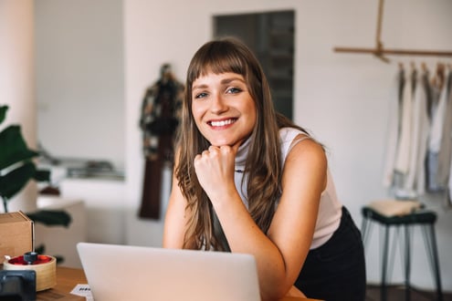 iStock_1411216718_store_owner_smiling